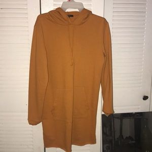 A orange hoodie shirt dress